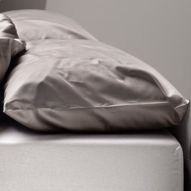 Federa copricuscino reversibile DaunenStep Oasi Kiss in cotone mako satin grigia