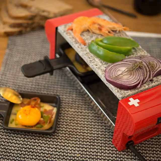 Raclette H.Koenig RP2 rossa con piastra in pietra naturale e rivestimento antiaderente per 2 persone