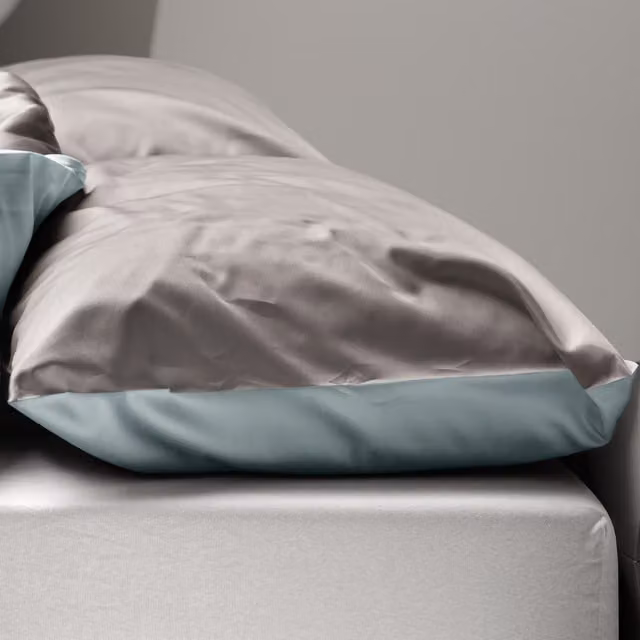 Federa copricuscino reversibile DaunenStep Oasi Kiss in cotone mako satin grigio
