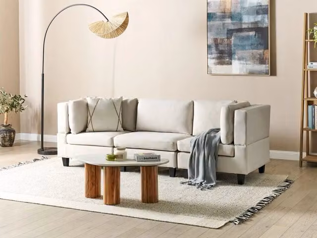 Divano modulare Beliani a 3 posti in tessuto beige con schienale imbottito e struttura in legno L: 228 cm, P: 76 cm, H: 72 cm