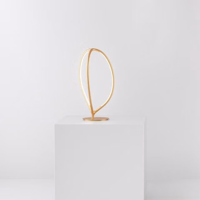 Artemide Arrival Lampada da tavolo in metallo color oro/ottone con LED luce bianca calda