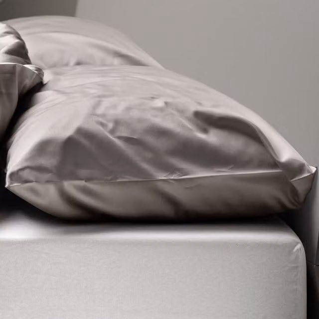 Federa copricuscino reversibile DaunenStep Oasi Kiss in cotone mako satin grigio