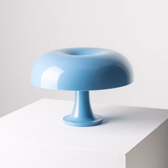 Artemide Nessino Lampada da tavolo in plastica blu con luce LED
