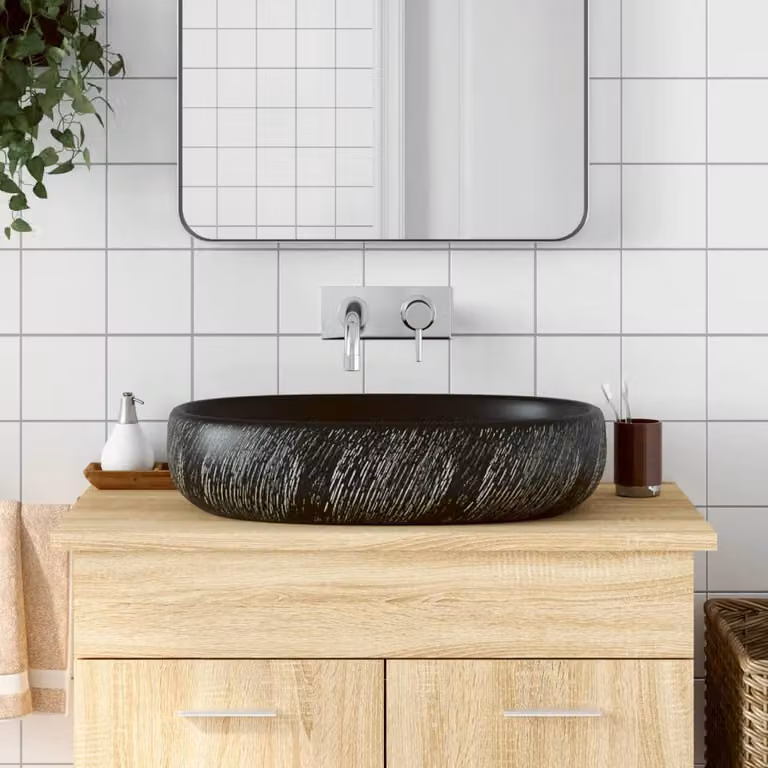 Lavabo da appoggio ovale vidaXL in ceramica nera L: 59 cm, P: 40 cm, H: 14 cm